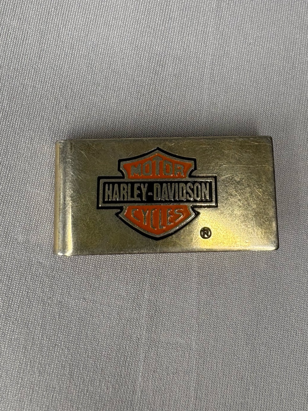Vintage 1997 Harley-Davidson Gold Tone Money Clip with Orange Logo